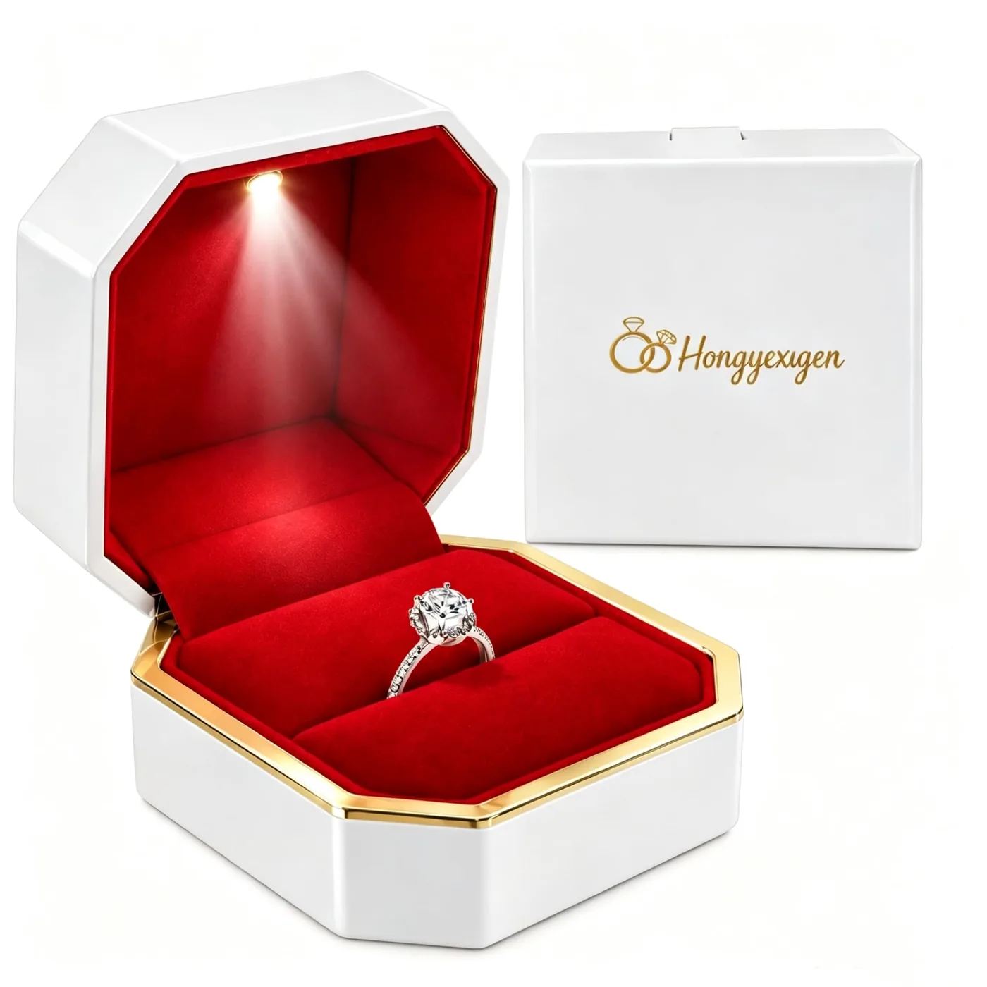 Velvet arch ring box open, white body with a red lining and the lid light on